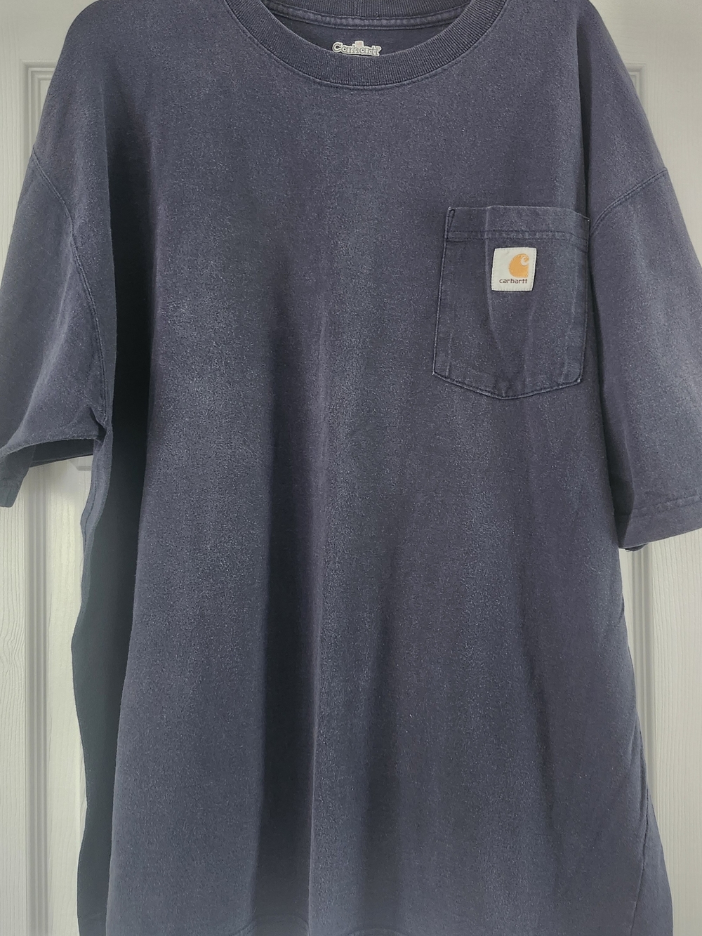 Vintage Carhartt Navy Short-Sleeve Pocket Tee with Gold Logo Patch